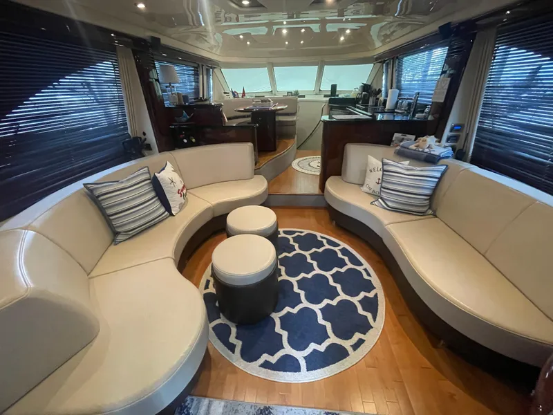 Slide: The Image of Luxurious interior of 2009 Sea Ray 580 Sedan Bridge yacht with elegant seating and decor. - 28