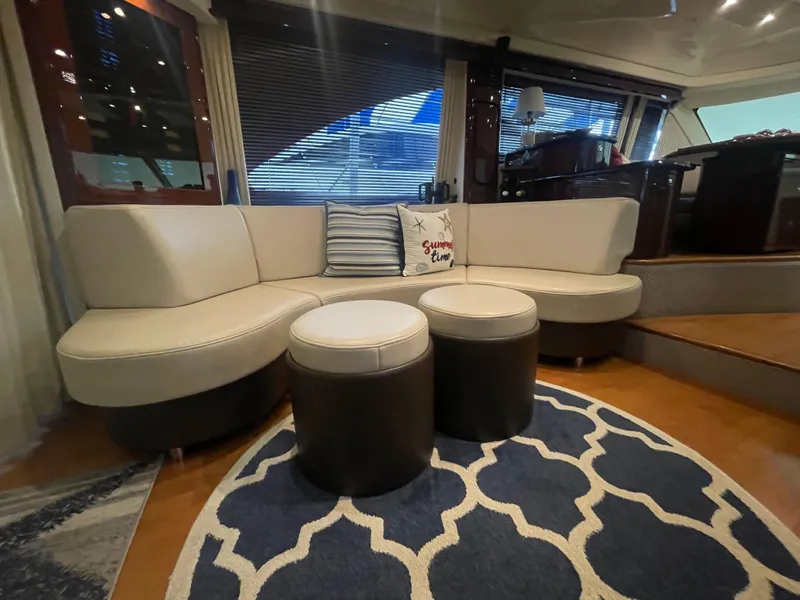 Slide: The Image of Luxurious interior of 2009 Sea Ray 580 Sedan Bridge with elegant seating and decor. - 29