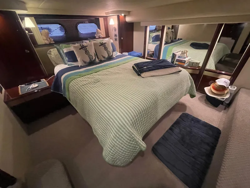 Slide: The Image of Luxurious bedroom interior of 2009 Sea Ray 580 Sedan Bridge yacht. - 39
