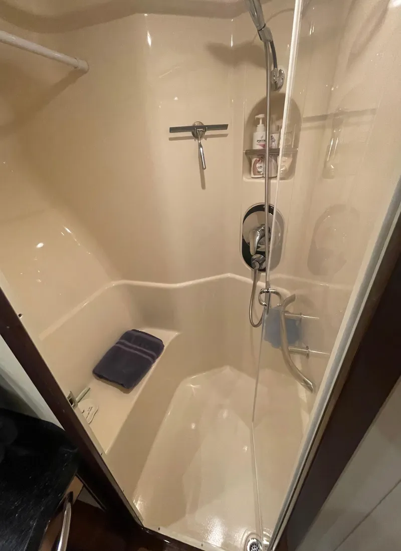 Slide: The Image of Shower area in 2009 Sea Ray 580 Sedan Bridge yacht, featuring sleek design and modern fixtures. - 46