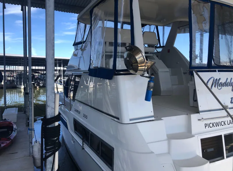 Slide: The Image of 1996 Carver 355 Aft Cabin yacht docked at Pickwick Lake marina. - 4