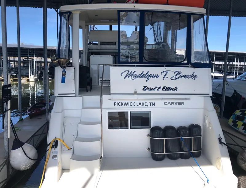 Slide: The Image of 1996 Carver 355 Aft Cabin yacht docked at Pickwick Lake, Tennessee. - 5