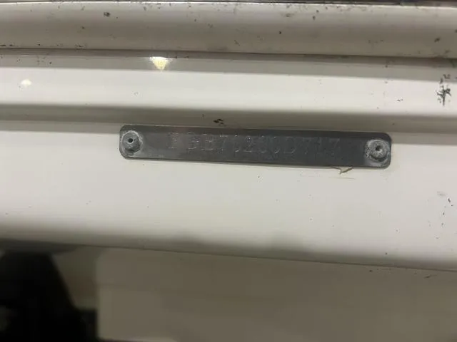 Slide: The Image of 2017 Chaparral 246 SSi boat identification plate on white surface. - 4