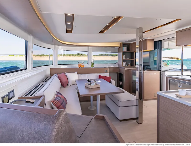 Slide: The Image of Luxurious interior of 2025 Lagoon 46 ICONIC yacht with modern furnishings and panoramic windows. - 11