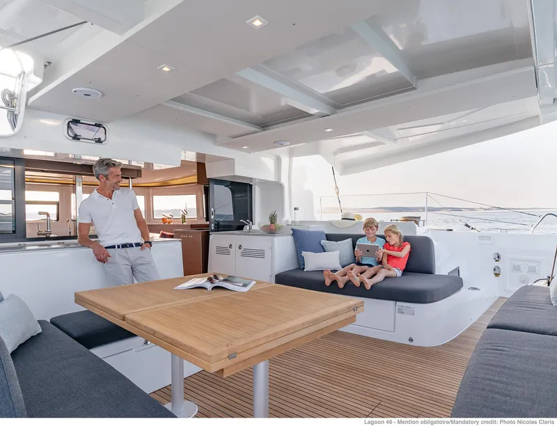 Slide: The Image of Family enjoying leisure time on the Lagoon 46 ICONIC yacht, 2025 model. - 8