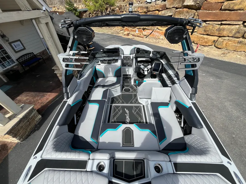 Slide: The Image of 2023 Tigé 22RZX boat interior with modern design and advanced audio system. - 14