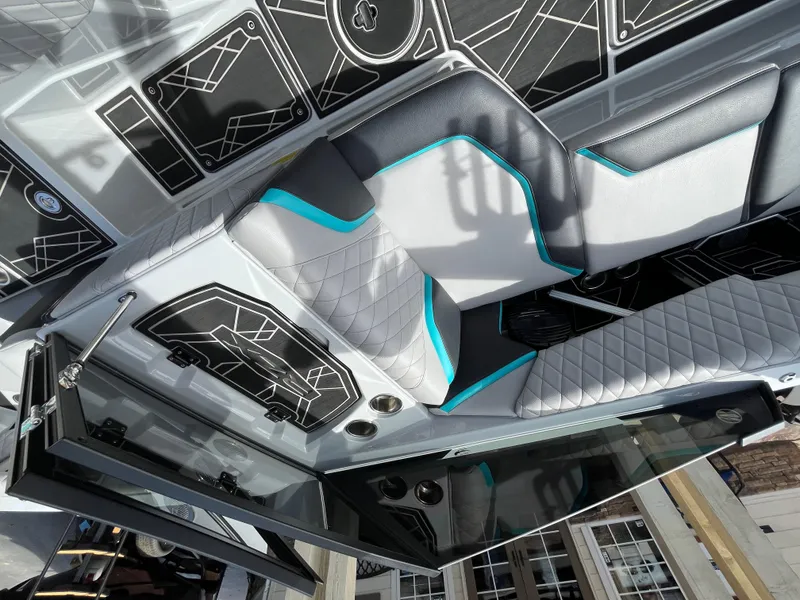 Slide: The Image of 2023 Tigé 22RZX boat interior with modern seating and sleek design elements. - 20