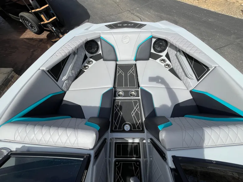 Slide: The Image of 2023 Tigé 22RZX boat interior with modern seating and sleek design. - 21