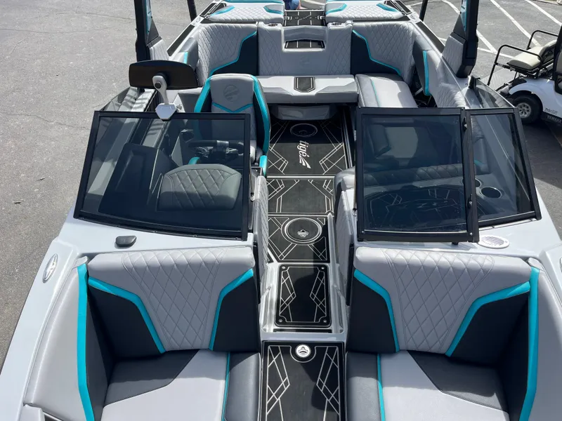 Slide: The Image of 2023 Tigé 22RZX boat interior with modern seating and sleek design. - 28