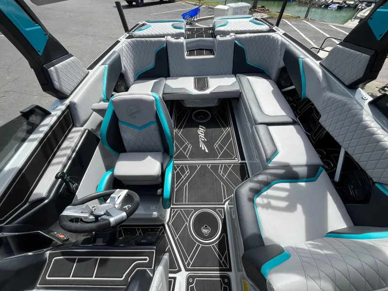 Slide: The Image of 2023 Tigé 22RZX boat interior with modern seating and sleek design. - 33