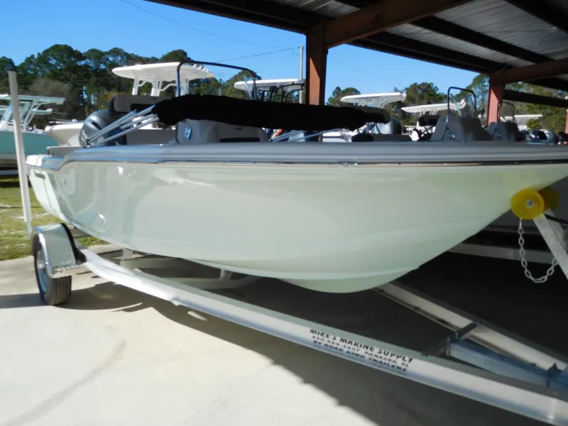 The Image of 2025 Tidewater 180 CC Adventure boat on trailer under shelter. - 1