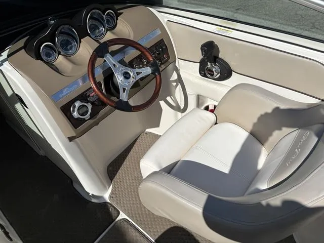 Slide: The Image of Engine compartment of a 2011 Sea Ray 260 Sundeck boat, featuring a 350 MAG engine. - 11