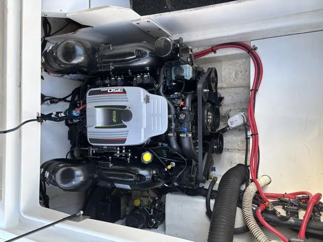 Slide: The Image of Engine compartment of a 2011 Sea Ray 260 Sundeck boat, featuring a 350 MAG engine. - 19