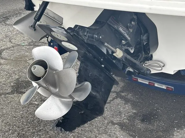 Slide: The Image of Propeller and outdrive of a 2011 Sea Ray 260 Sundeck boat on a trailer. - 22