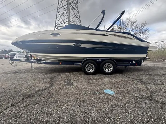 Slide: The Image of 2011 Sea Ray 260 Sundeck boat interior with sink and storage area. - 4