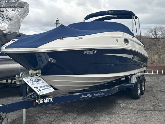 Slide: The Image of Interior view of a 2011 Sea Ray 260 Sundeck boat, showing storage compartment. - 8
