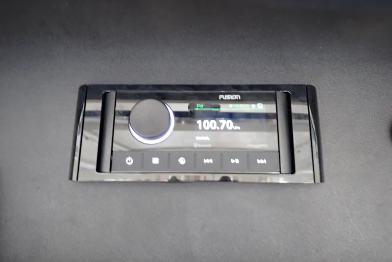 Slide: The Image of Fusion marine stereo system on 1999 Albemarle 320 Express boat dashboard. - 21