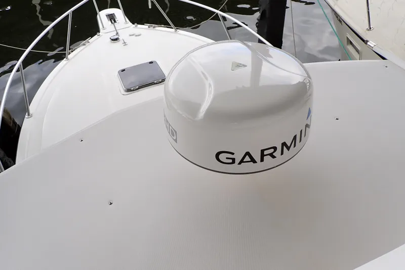 Slide: The Image of 1999 Albemarle 320 Express boat with Garmin radar on deck. - 26