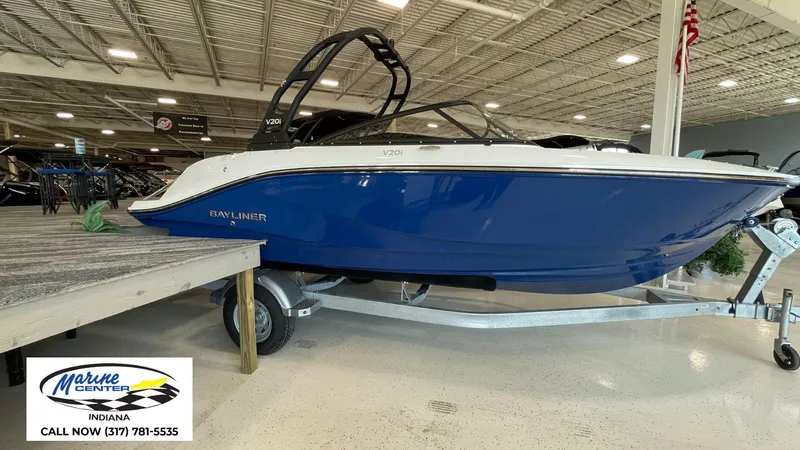 Slide: The Image of 2025 Bayliner V20i boat on display at Marine Center Indiana showroom. - 1