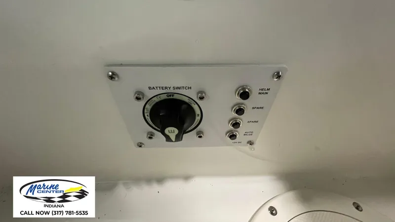 Slide: The Image of Battery switch panel on 2025 Bayliner V20i boat, featuring multiple control switches. - 6
