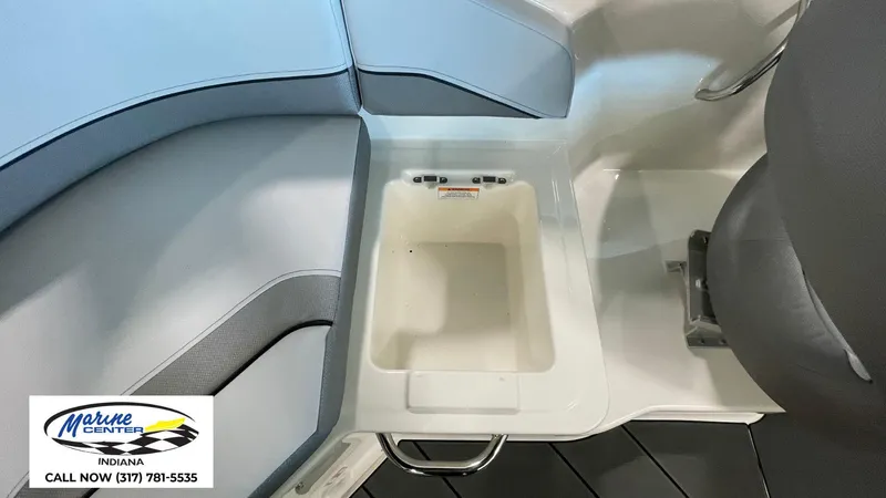 Slide: The Image of Interior of 2025 Bayliner V20i boat with seating and storage compartment. - 7