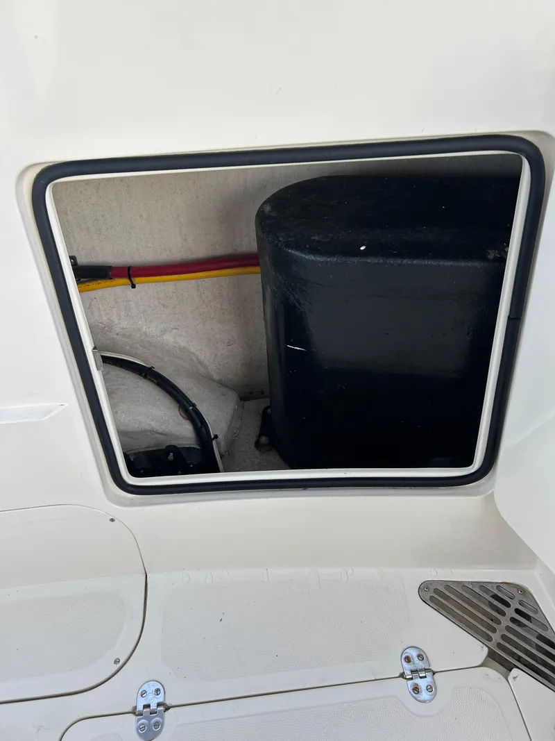 Slide: The Image of Storage compartment on a 2001 Hinckley Classic 36 Picnic Boat. - 14