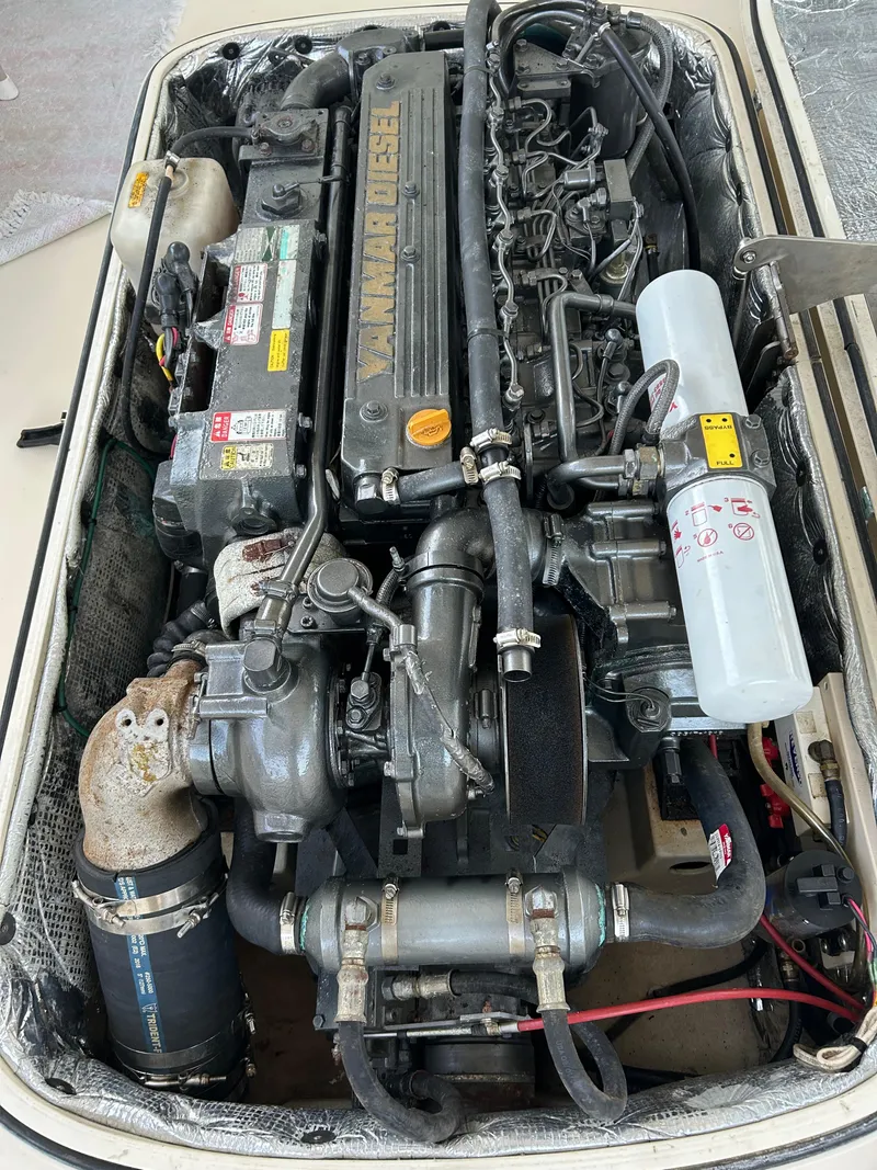 Slide: The Image of Engine of a 2001 Hinckley Classic 36 Picnic Boat, showcasing Yanmar diesel components. - 17