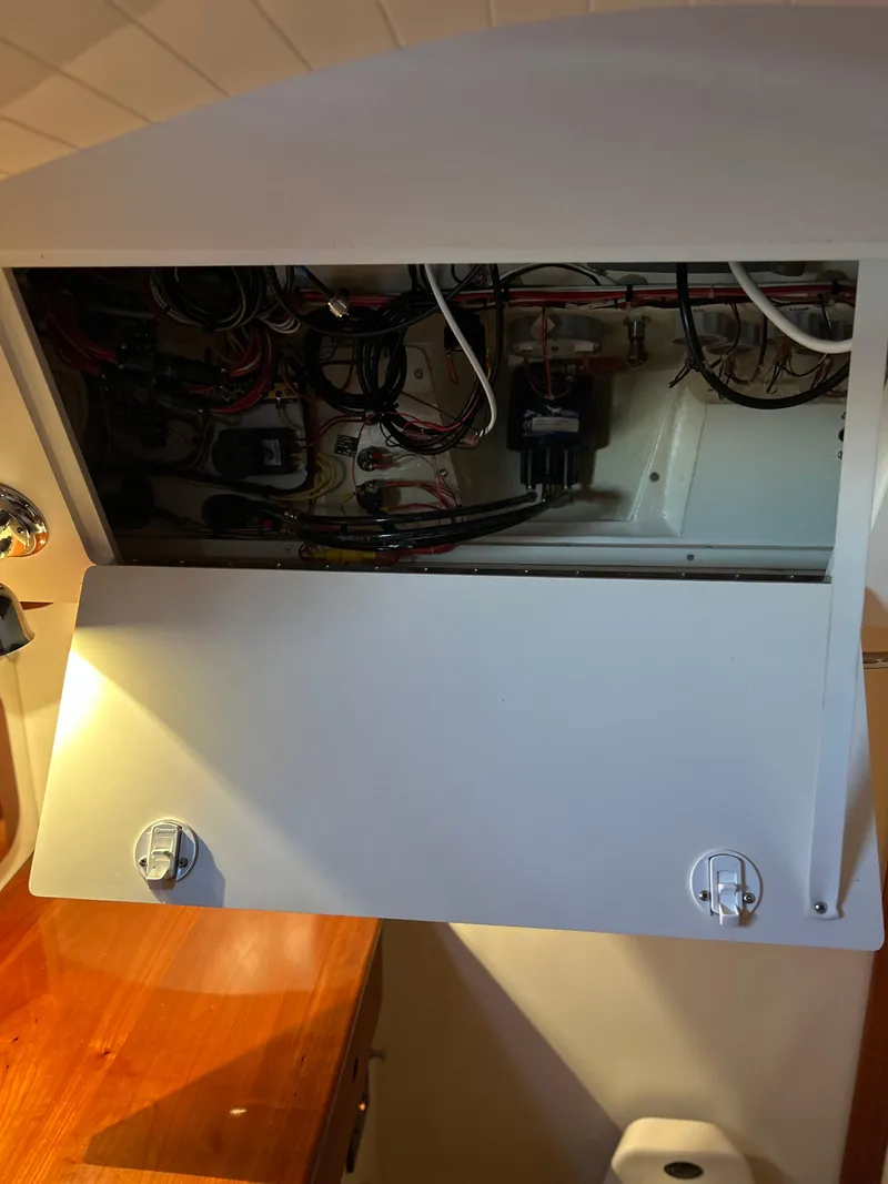 Slide: The Image of Electrical panel inside a 2001 Hinckley Classic 36 Picnic Boat. - 42