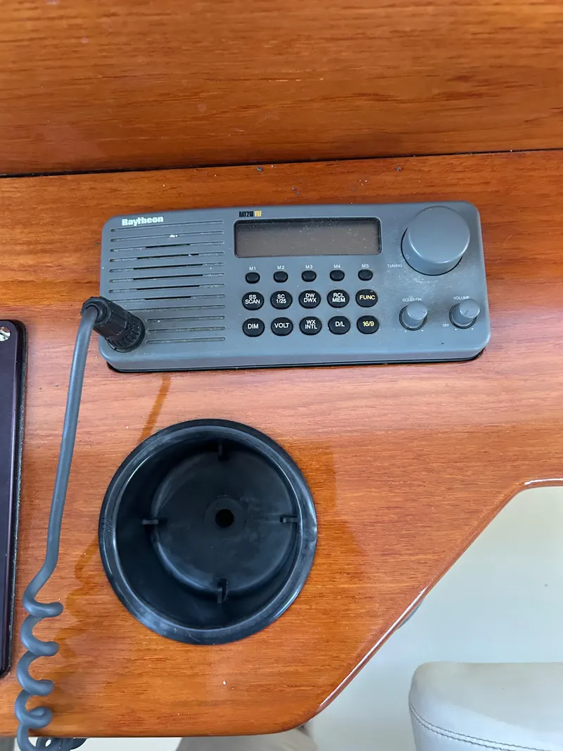 Slide: The Image of Boat radio equipment on 2001 Hinckley Classic 36 Picnic Boat dashboard. - 26