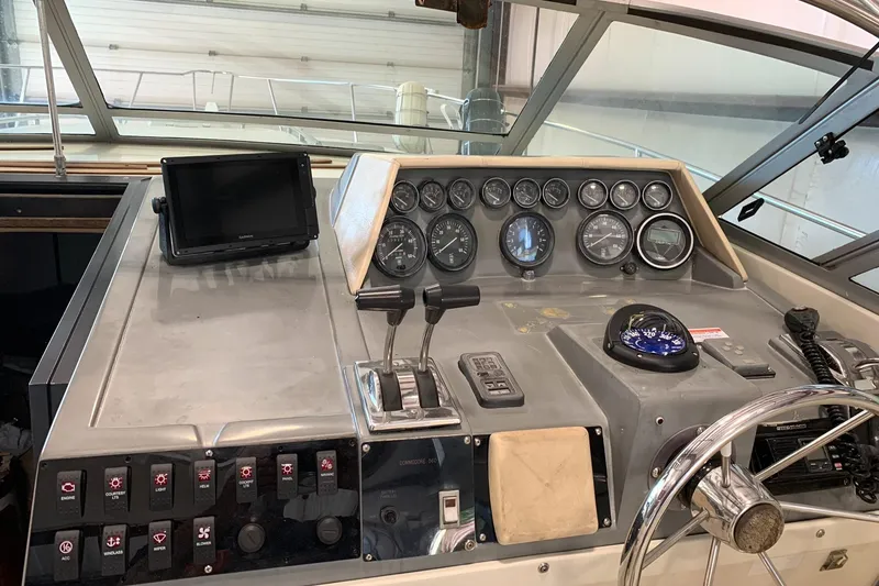 Slide: The Image of 1988 Regal 360 XL Commodore helm with updated controls and gauges, showcasing fantastic value. - 16