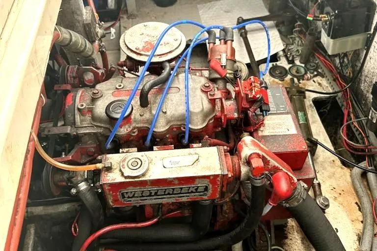 Slide: The Image of Engine of 1988 Regal 360 XL Commodore, featuring Westerbeke components and updated wiring. - 21