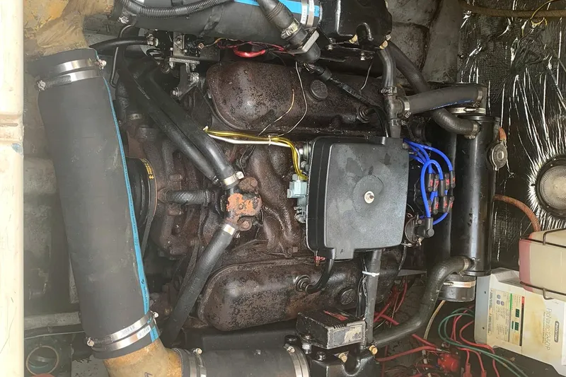 Slide: The Image of 1988 Regal 360 XL Commodore engine, nicely updated, showcasing detailed mechanical components. - 23