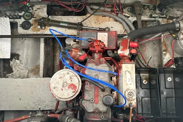 Slide: The Image of Engine compartment of 1988 Regal 360 XL Commodore, showcasing updated components and wiring. - 25