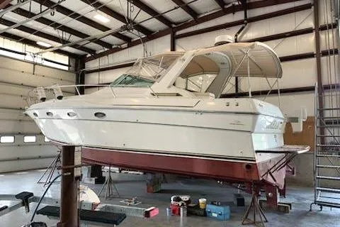 Slide: The Image of 1988 Regal 360 XL Commodore yacht in a warehouse, nicely updated and maintained. - 3