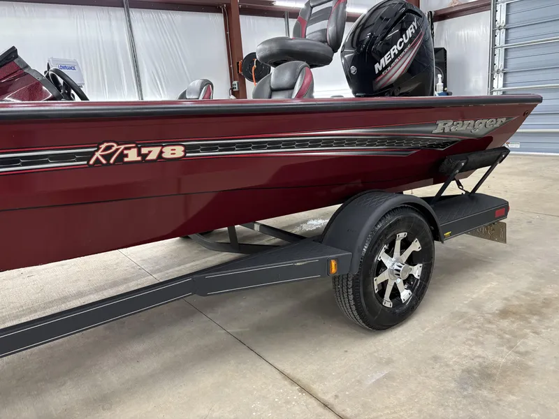 Slide: The Image of 2019 Ranger RT178 boat with Mercury engine on trailer in garage. - 4