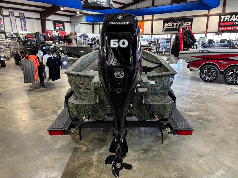Slide: The Image of 2025 Tracker 1650 Prairie Wings Edition boat with Mercury 60 engine in showroom. - 4