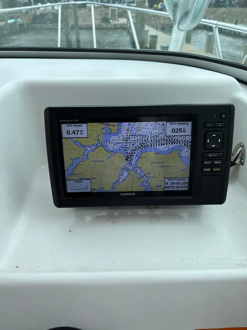 Slide: The Image of Garmin GPS display on 2003 Seaswirl Striper 2301 Walkaround OB boat dashboard. - 9