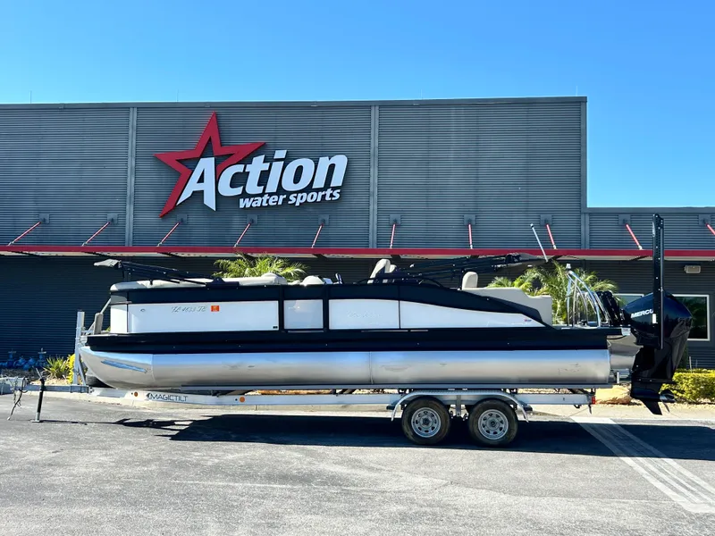 Slide: The Image of 2022 Barletta C24UC pontoon boat on trailer at Action Water Sports. - 1