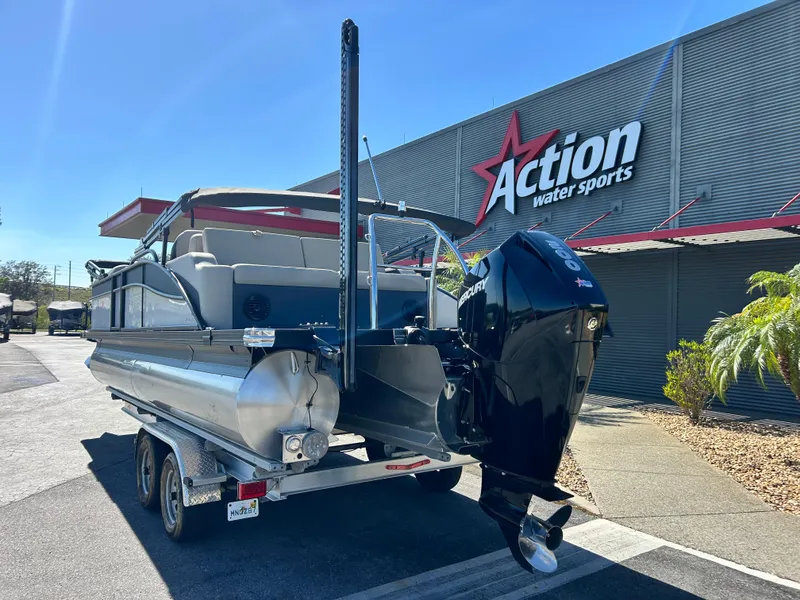 Slide: The Image of 2022 Barletta C24UC pontoon boat at Action Water Sports dealership. - 12