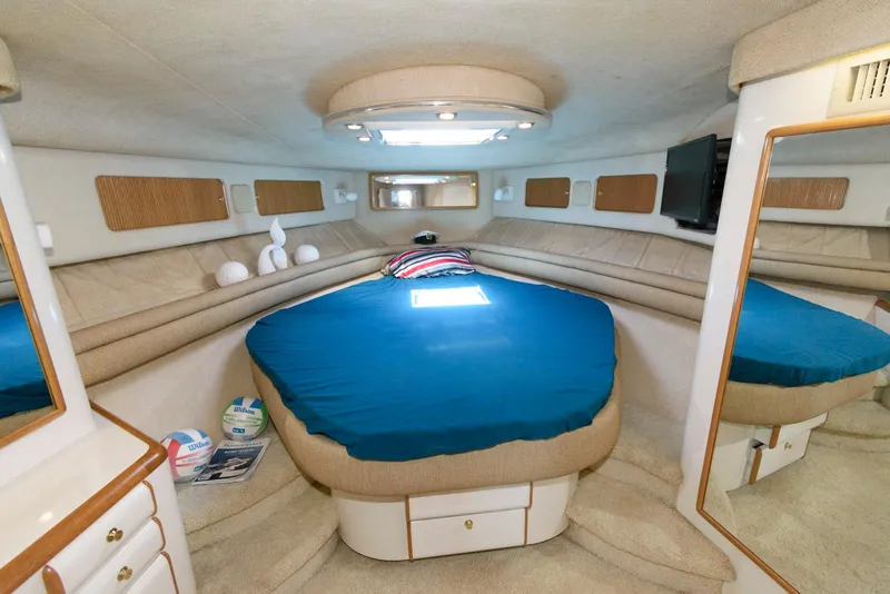 Slide: The Image of Luxurious interior of a 1995 Sea Ray 500 Sedan Bridge yacht cabin. - 21