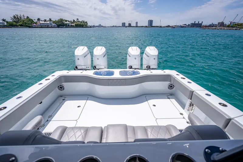 Slide: The Image of 2024 Freeman 43 boat with quad engines on a sunny day at sea. - 17