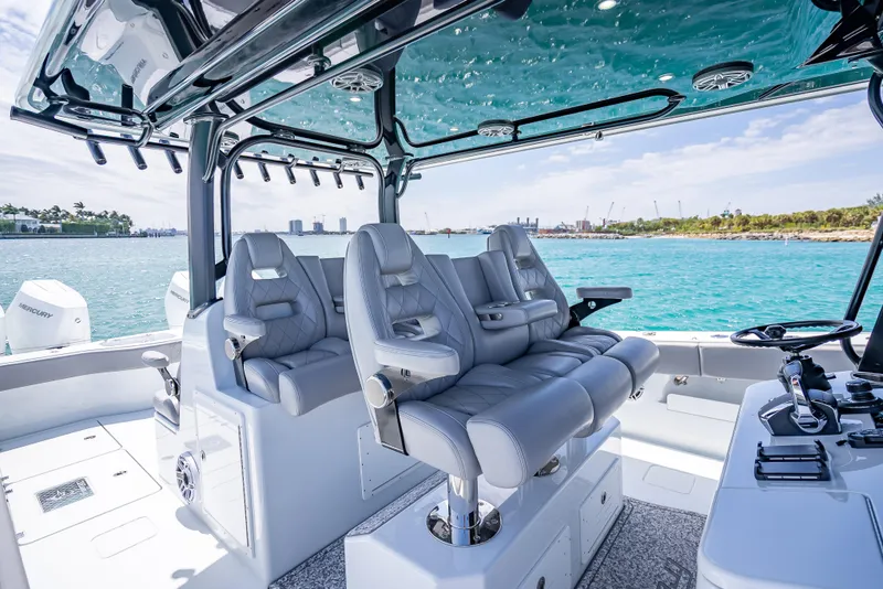 Slide: The Image of 2024 Freeman 43 boat interior with luxurious seating and ocean view. - 28