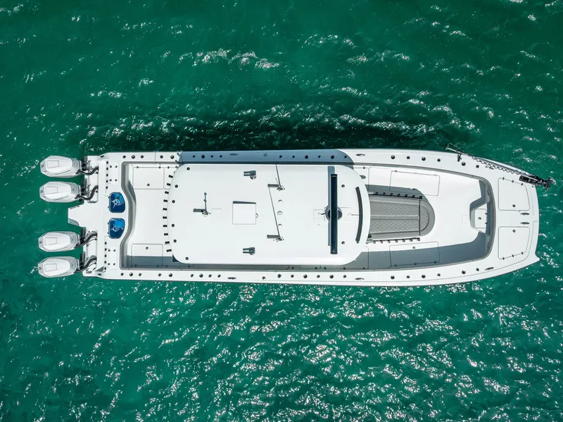 Slide: The Image of Aerial view of 2024 Freeman 43 boat on turquoise water. - 8