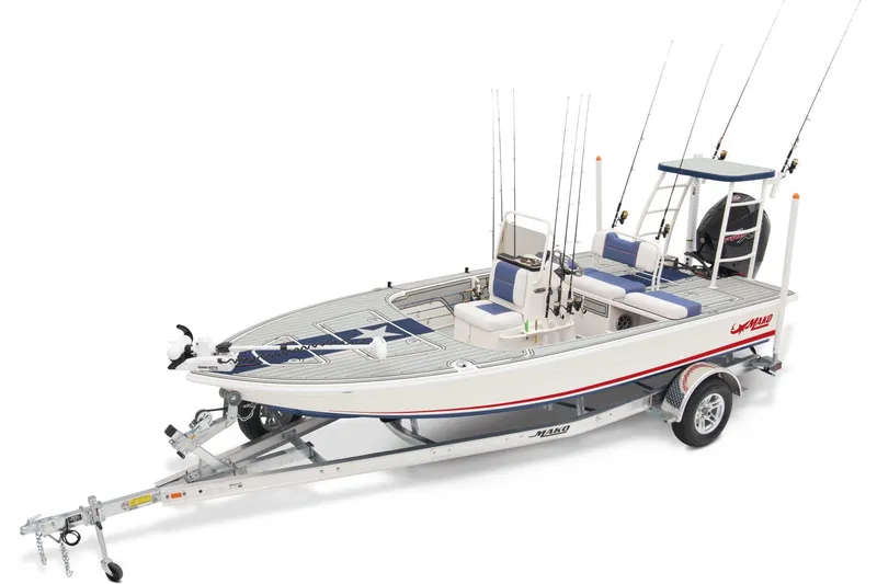 Slide: The Image of 2025 Mako 18 Pro Skiff Patriot Edition boat on trailer outside Bass Pro Shops. - 2