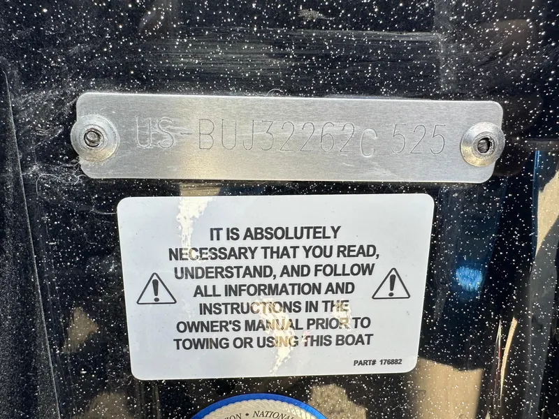 Slide: The Image of 2025 Nitro Z19 boat warning label emphasizing manual reading before towing or use. - 21