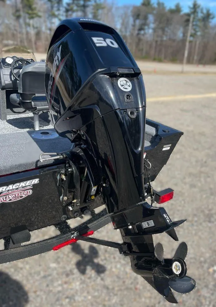 Slide: The Image of 2025 Tracker Super Guide V-16 SC boat with a powerful Mercury outboard motor. - 6