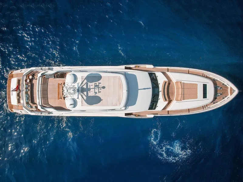 Slide: The Image of Aerial view of 33rd Strike Group model1123 yacht, 2026, cruising in deep blue ocean. - 7