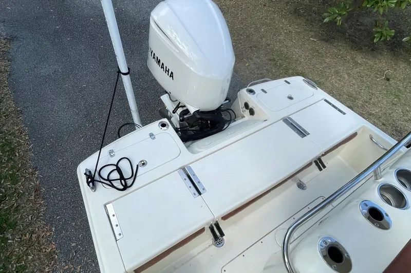 Slide: The Image of 2015 Scout 251 XS boat with Yamaha outboard motor, rear deck view. - 14