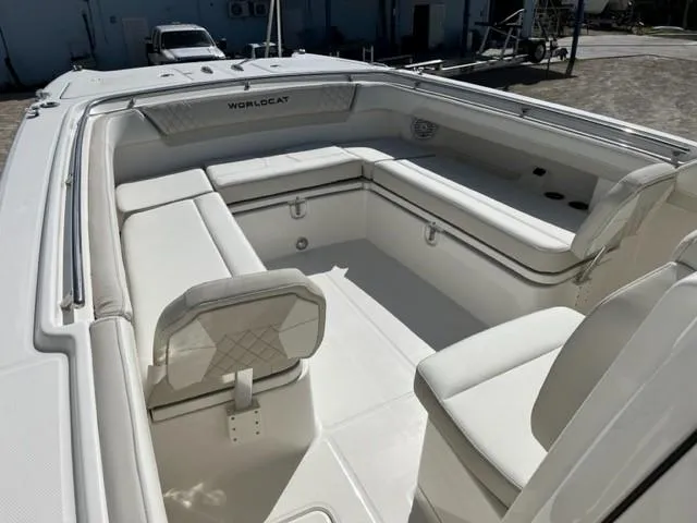 Slide: The Image of 2025 World Cat 280 CC-X boat interior with white seating and spacious layout. - 4