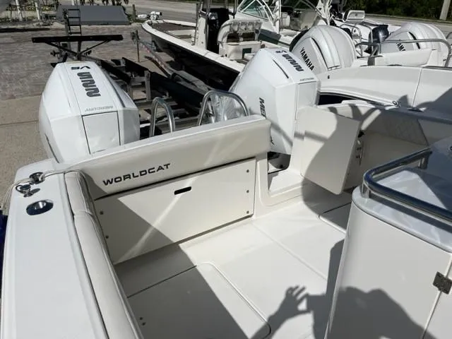 Slide: The Image of 2025 World Cat 280 CC-X boat interior with Yamaha engines, showcasing spacious seating and storage. - 6